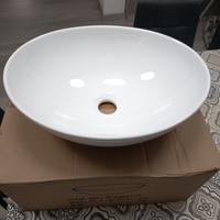 Lavabo da appoggio con rubinetto