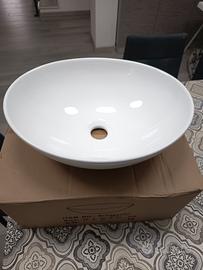 Lavabo da appoggio con rubinetto