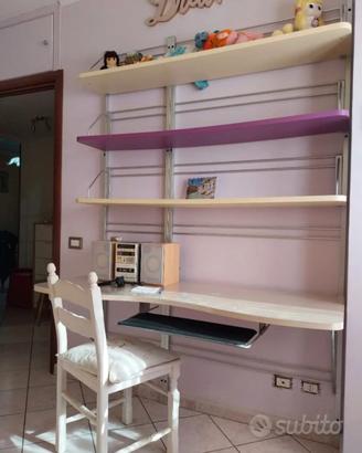 cameretta con due letti e cabina armadio