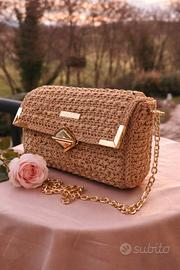 Borsa pochette color oro