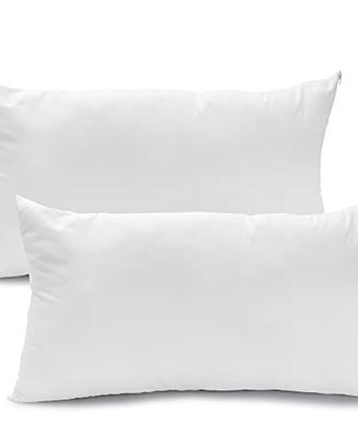 Cuscini bianchi per letto