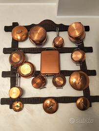 pentole in rame e reggi pentole in legno