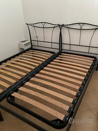 Struttura letto con reti di doghe
