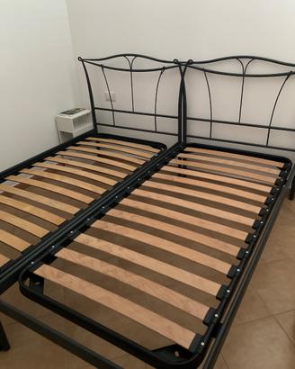 Struttura letto con reti di doghe