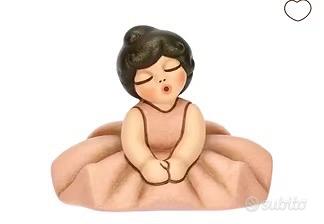 Bambolina seduta THUN