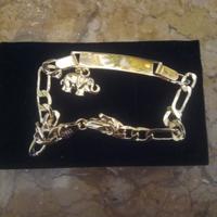 Braccialetto dorato con elefantino