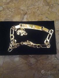 Braccialetto dorato con elefantino