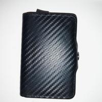 borsello tommy hilfiger e portacarte bronzi