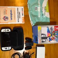 Nintendo Switch OLED completa + scatola + custodia