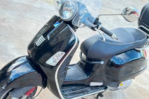 Vespa 125 con bauletto pochi chilometri