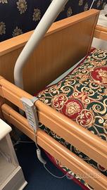 Letto con sponde e sistema elettrico come nuovo