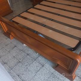 struttura letto matr. noce e rete  Eminflex 