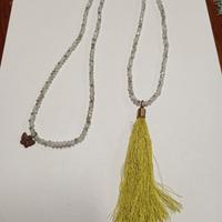 collana con farfalla e nappa