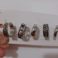 5 anelli argentati H&M NO bracciali oro ferro plat