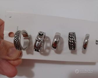 5 anelli argentati H&M NO bracciali oro ferro plat