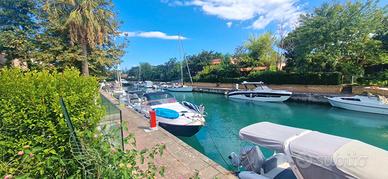 PORTOROSA - casa a schiera con giardino sul canale
