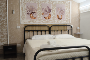 Camere con bagno privato e parcheggio