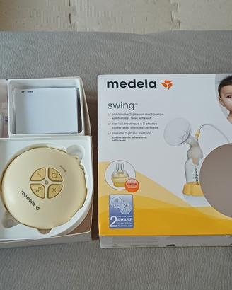 Tiralatte Medela Swing con biberon Calma