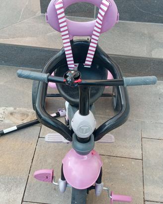 triciclo con manico per bambini