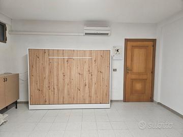 Letto matrimoniale a scomparsa