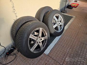 4  cerchi enzo + 4 gomme invernali falken