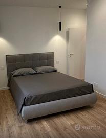 Letto matrimoniale contenitore in tessuto