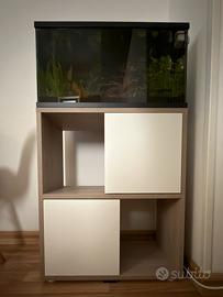 Acquario con supporto, ghiaia… in garanzia.