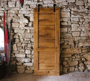 Porte "da fienile" in legno massello su misura