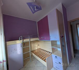 Cameretta bambini 2 posti castello ad angolo