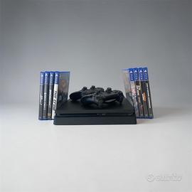 Playstation 4 slim con 2 controller e 9 giochi