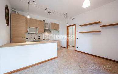 BILOCALE CON GIARDINO E GARAGE