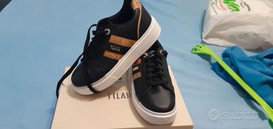 scarpe nike e prima classe 