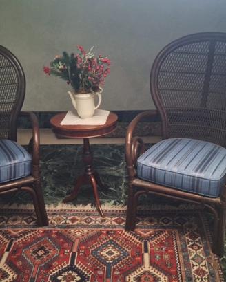 Coppia di poltrone vintage in legno e rattan