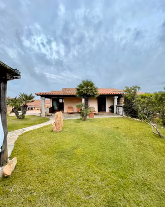 Villa con giardino porto taverna - San Teodoro