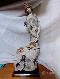 Statua Capodimonte signora con cane 