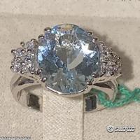 ANELLO ORO 18kt. DIAMANTI ED ACQUAMARINA OVALE