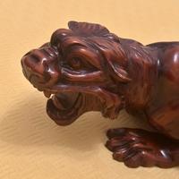 Pantera in legno massiccio intagliato