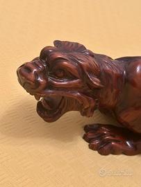 Pantera in legno massiccio intagliato