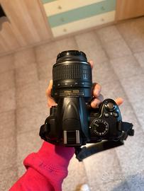 Nikon D3000 + obiettivo 18-55mm