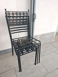 tavolo mosaico con sedie in ferro