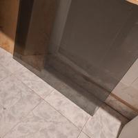 pouff  tavolinetto in stoffa nera con vetro 