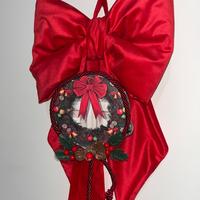 Fiocco natalizio in velluto rosso con tamburello