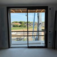 Scorrevole alzante in alluminio schuco