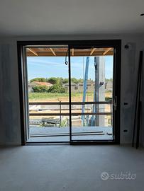 Scorrevole alzante in alluminio schuco