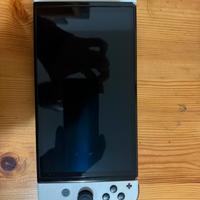 Nintendo Switch OLED con due giochi