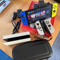 Nintendo Switch OLED + due Joycon extra e altro