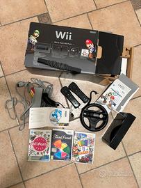 Wii Nintedo ”Mario Kart Wii Pack”+ 3 giochi.