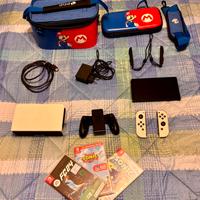 Nintendo Switch Oled più accessori e giochi