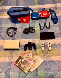 Nintendo Switch Oled più accessori e giochi