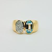 Anello oro 18 kt topazio azzurro e diamanti ct0.30